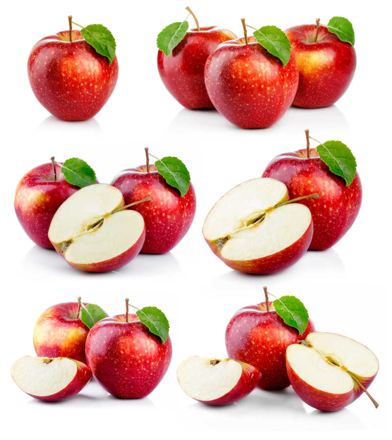 成熟的红苹果与绿叶分离