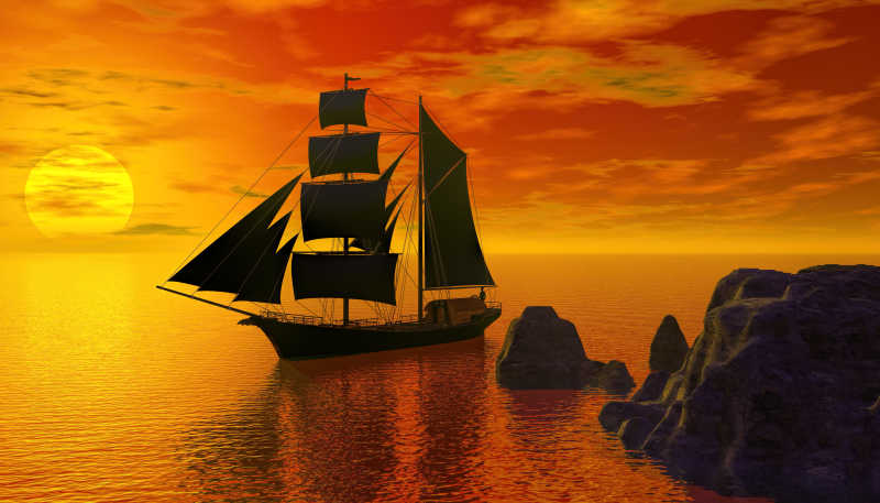 日落美景下停在海上的帆船