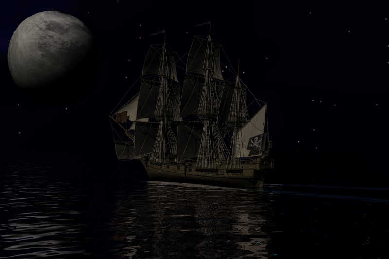 夜晚行驶在海上的帆船