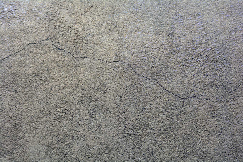 开裂的水泥路面纹理背景