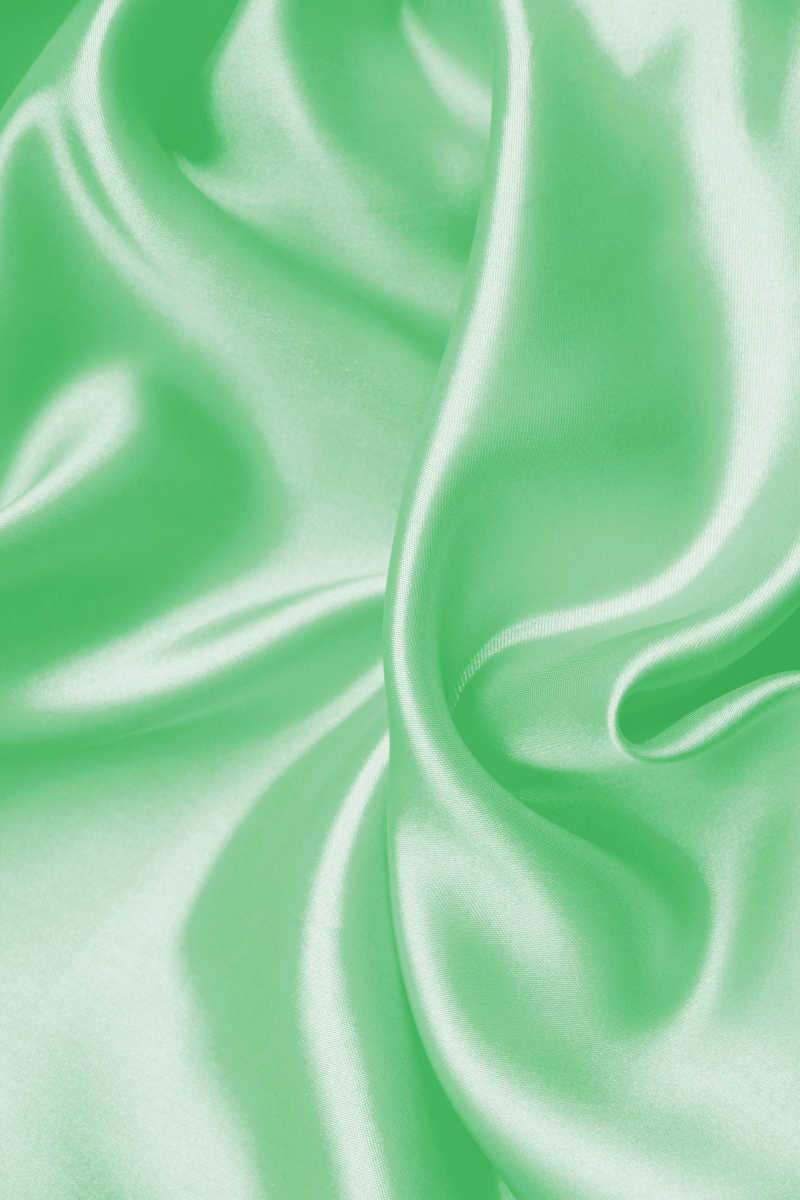 光滑的绿色丝绸特写