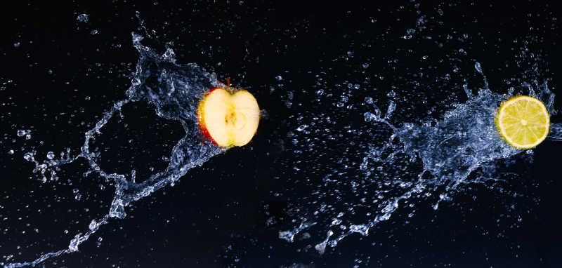 苹果柠檬与水花飞溅的镜头