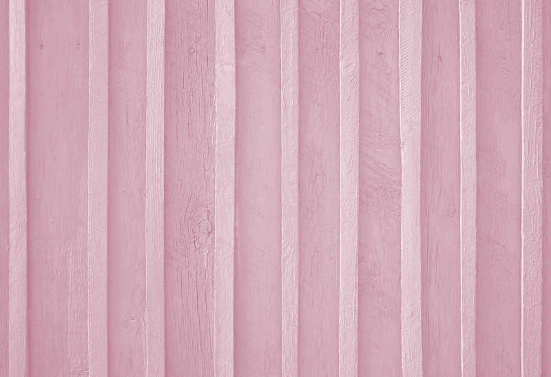 浅玫瑰色粉彩木背景纹理