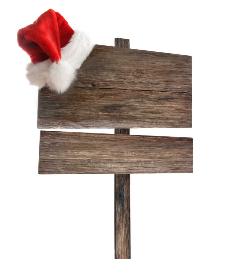带有圣诞帽的木制广告牌