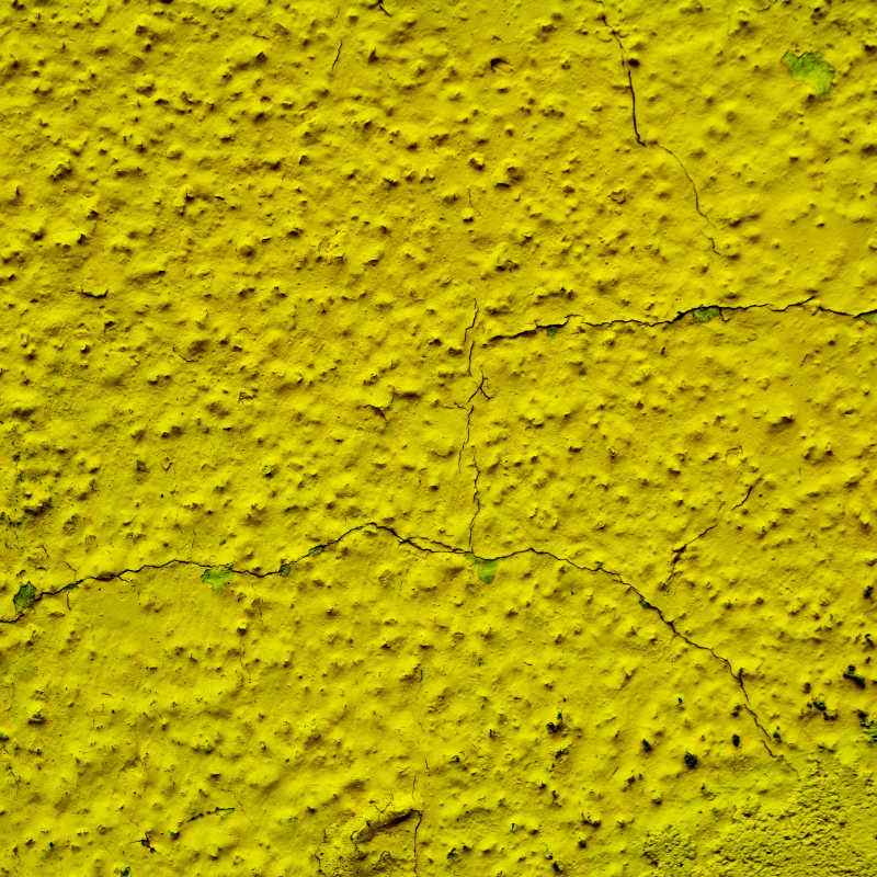 黄绿色背景混凝土墙