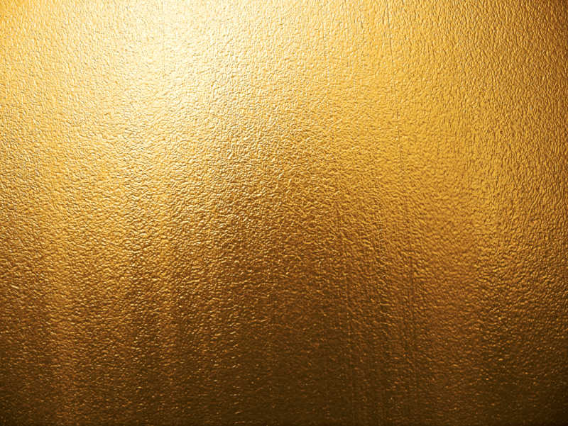 金色钢板表面的磨砂纹理