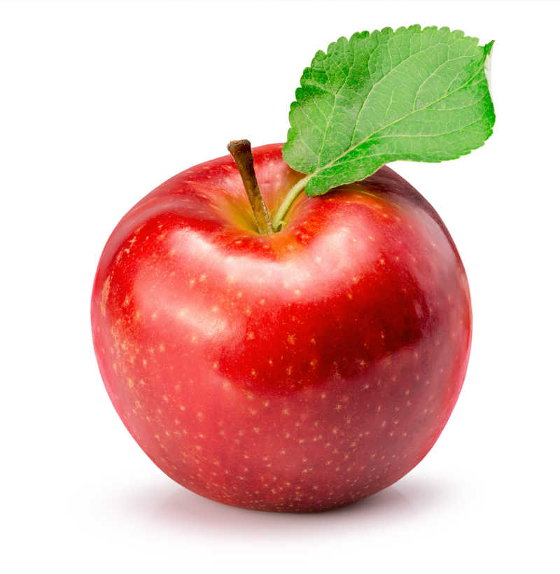 放在白色背景上的有叶子的红苹果