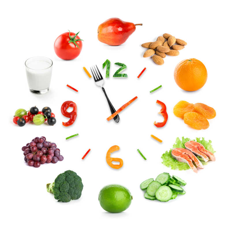 白色背景上的健康果蔬概念钟