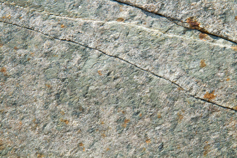 凹凸不平的纹理背景的石材表面
