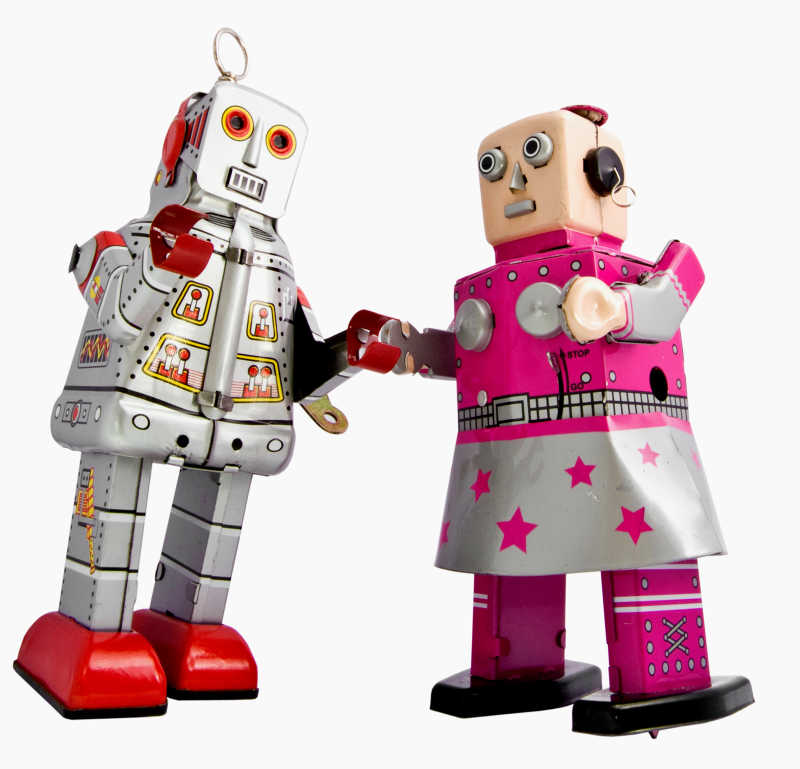 白色背景下的两个机器人玩具
