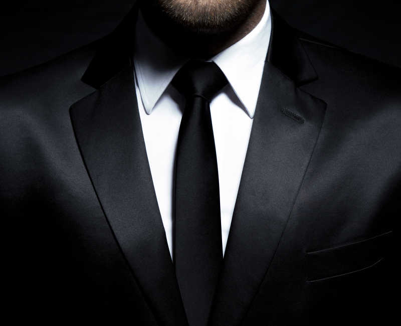 穿黑西装打领带的男士绅士