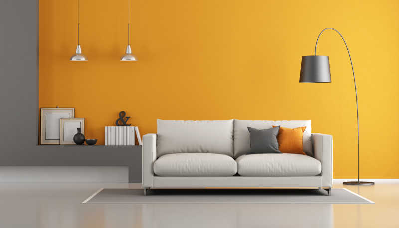 灰橙现代客厅沙发和黄色的壁纸背景