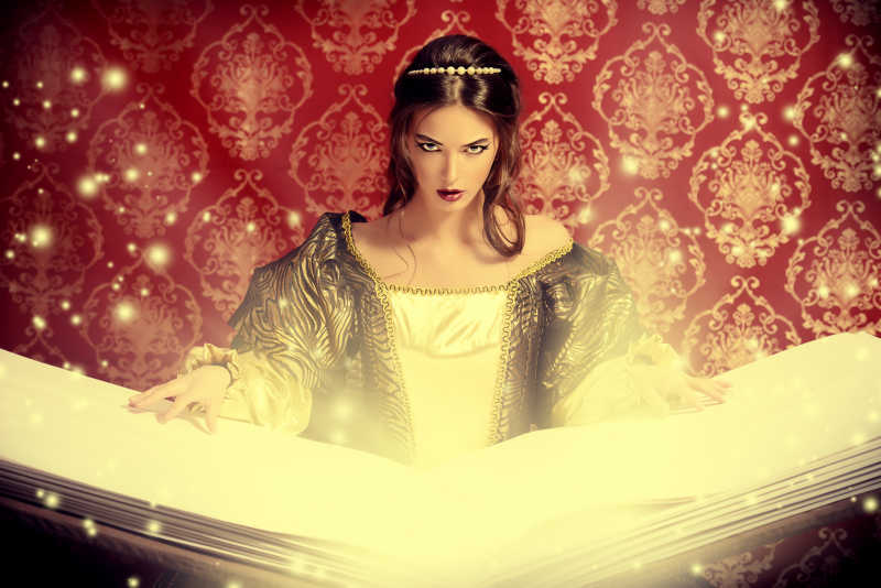 美丽的公主打开巨大的魔法书