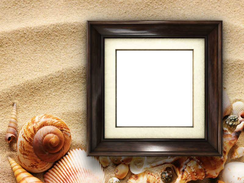 沙子背景上的空白画框