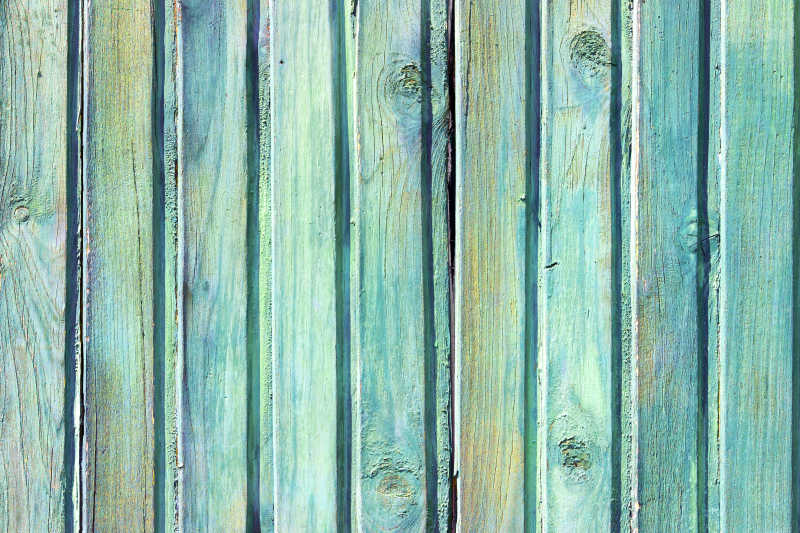 陈旧的喷有蓝色油漆的木墙