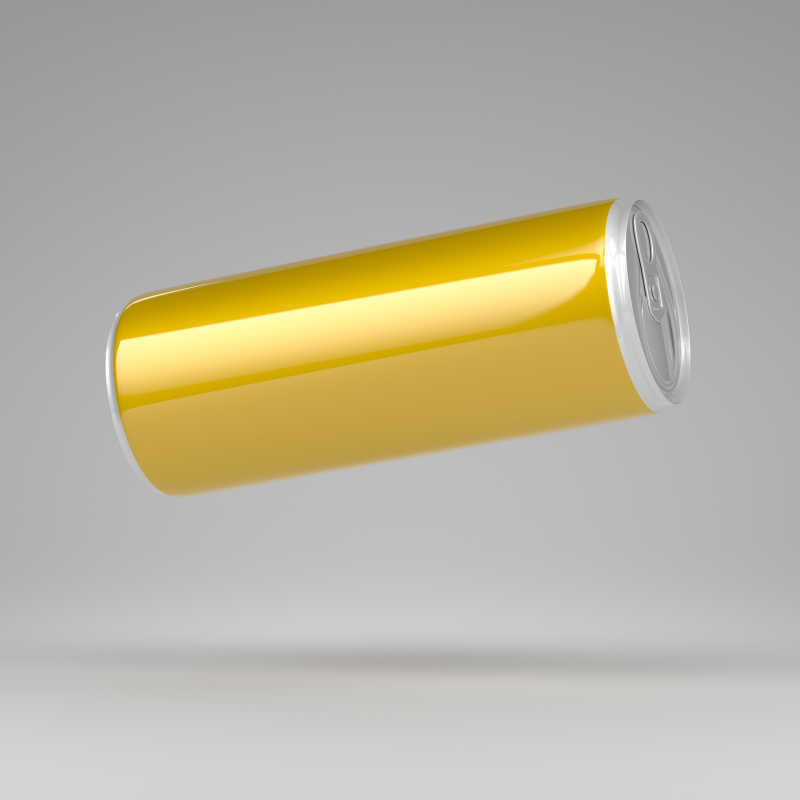 半空中的黄色铝制苏打水饮料罐
