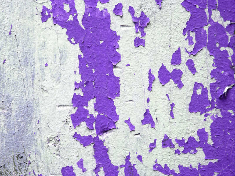 紫色掉漆的混凝土墙纹理背景