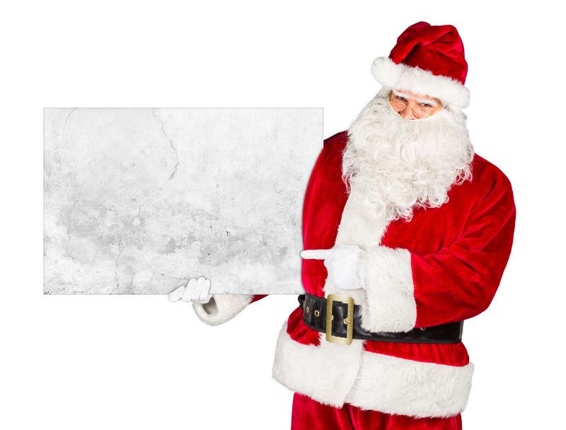 白色背景下的圣诞老人与它手里空空的广告牌