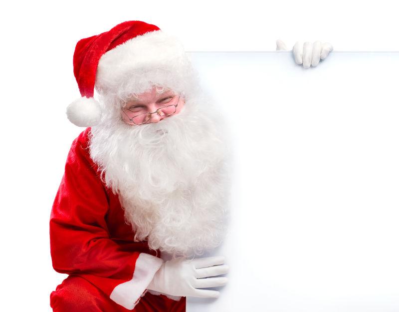 圣诞老人扶着空白海报
