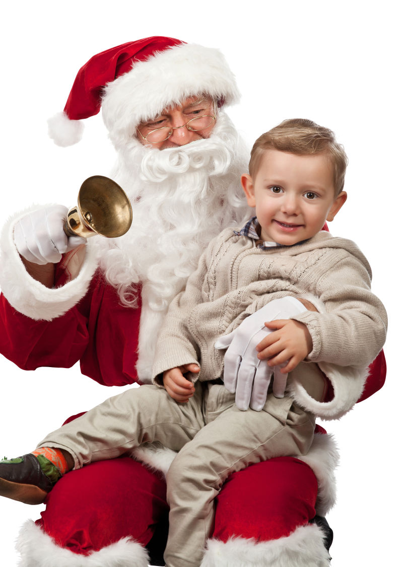 圣诞老人抱着孩子一起玩铃铛