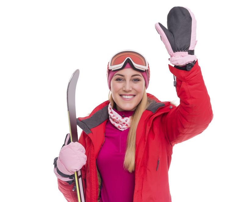 白色背景的漂亮女孩滑雪者