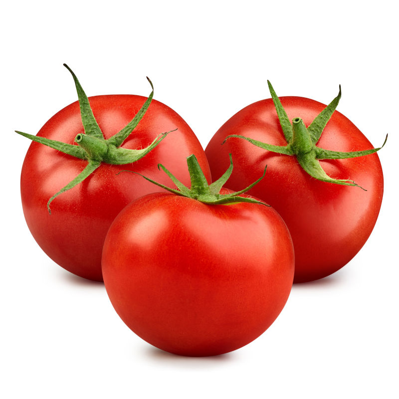 白色背景下的三个西红柿