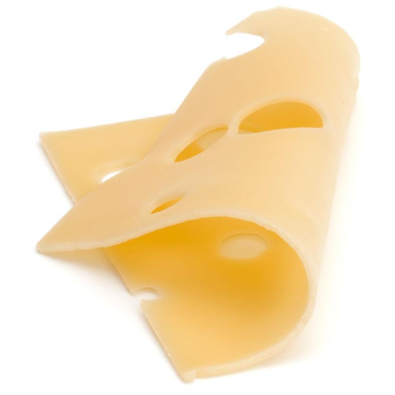 一个白色背景的奶酪切片