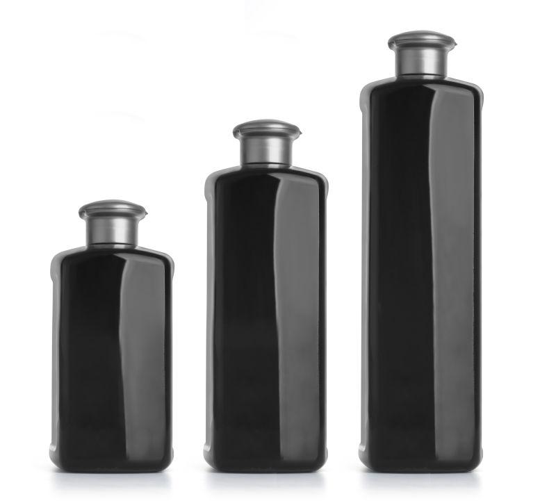三个不同规格的黑色洗发水瓶