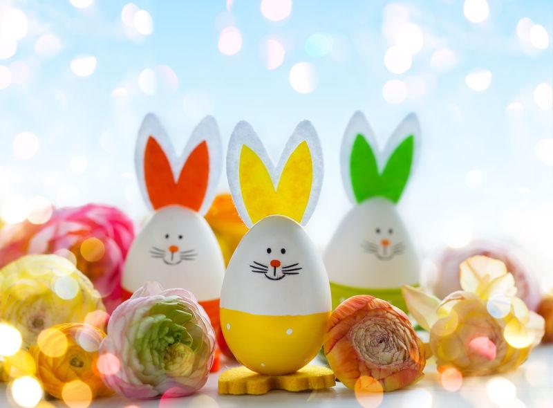 鲜花和兔子彩蛋的复活节装饰