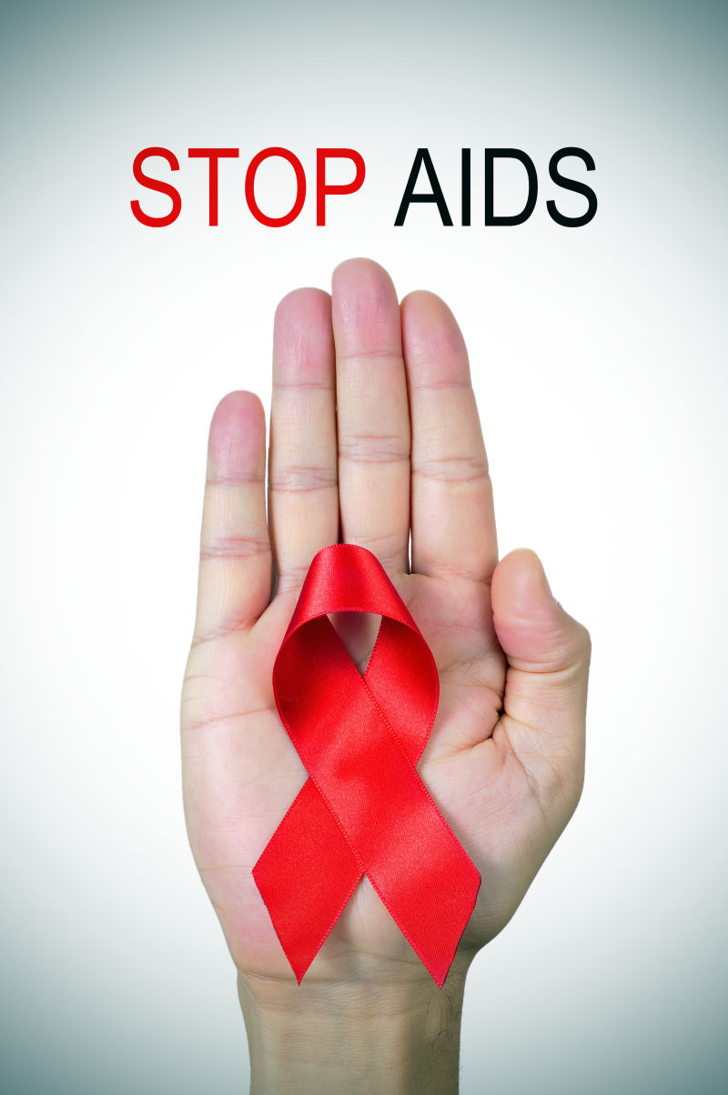 文字阻止艾滋和男人的红丝带