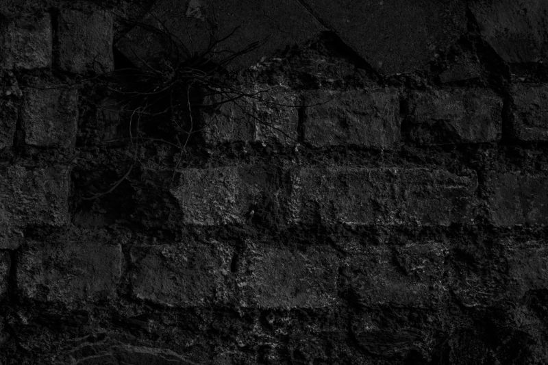 古老的砖墙黑色背景