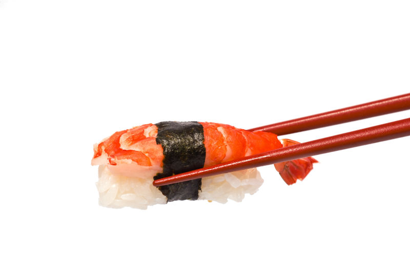 用筷子夹着寿司