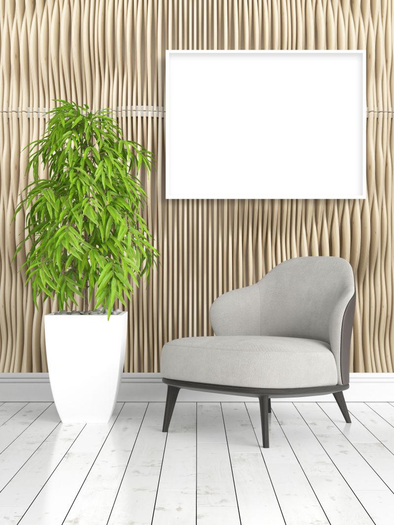 美丽的客厅内饰与模拟海报框架和灰色椅