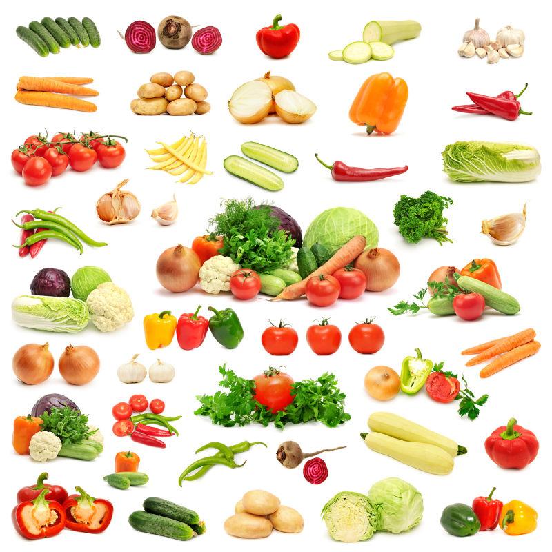 白色背景上的很多蔬菜与水果