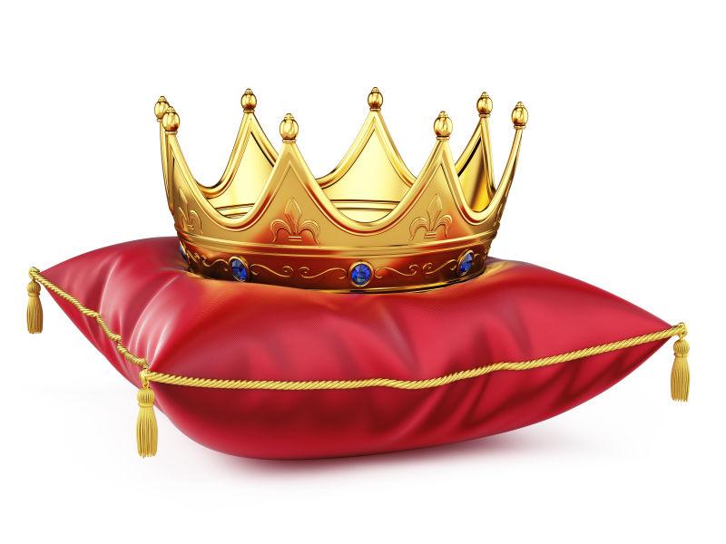 红色枕头上的皇家金冠