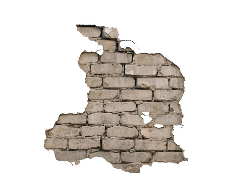 墙壁破洞上漏出的砖头