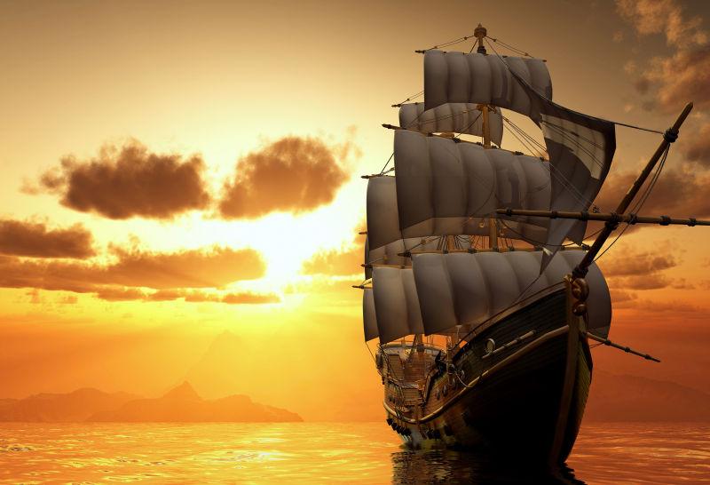 日落时分在海上的帆船