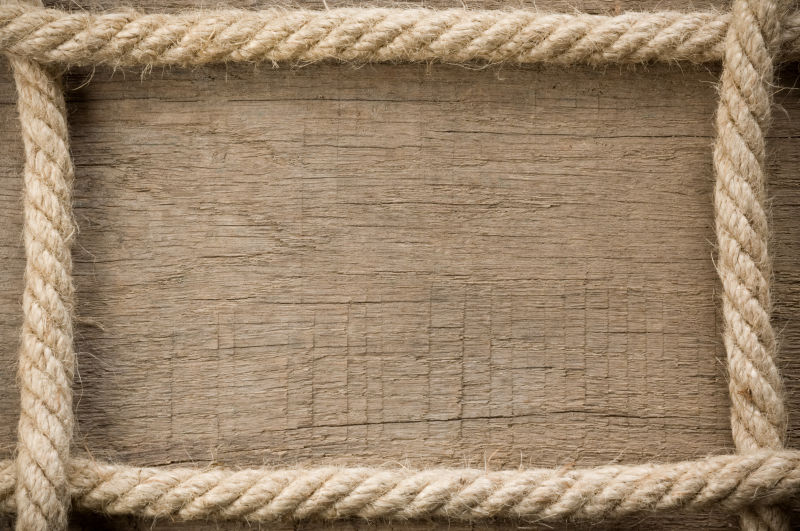 木材背景的的船用绳索框架