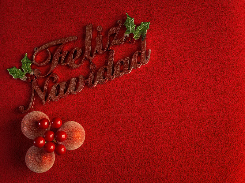 红色背景中的圣诞节配文字装饰品