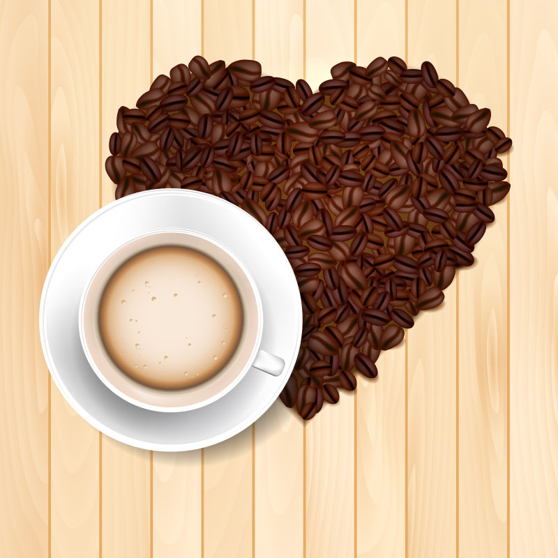 矢量桌上的心形咖啡豆和咖啡