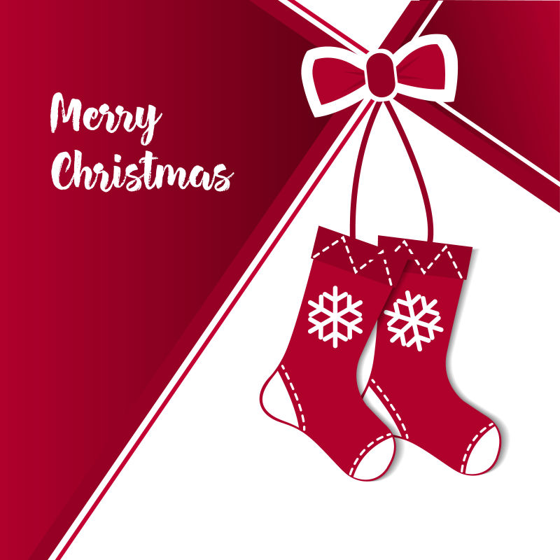 一双红色的圣诞袜和蝴蝶结的矢量圣诞元素背景