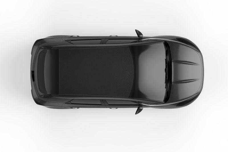 白色背景下的黑色汽车模型3D顶视图