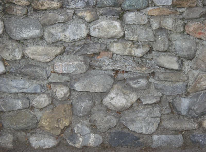 石子水泥堆砌的石墙背景