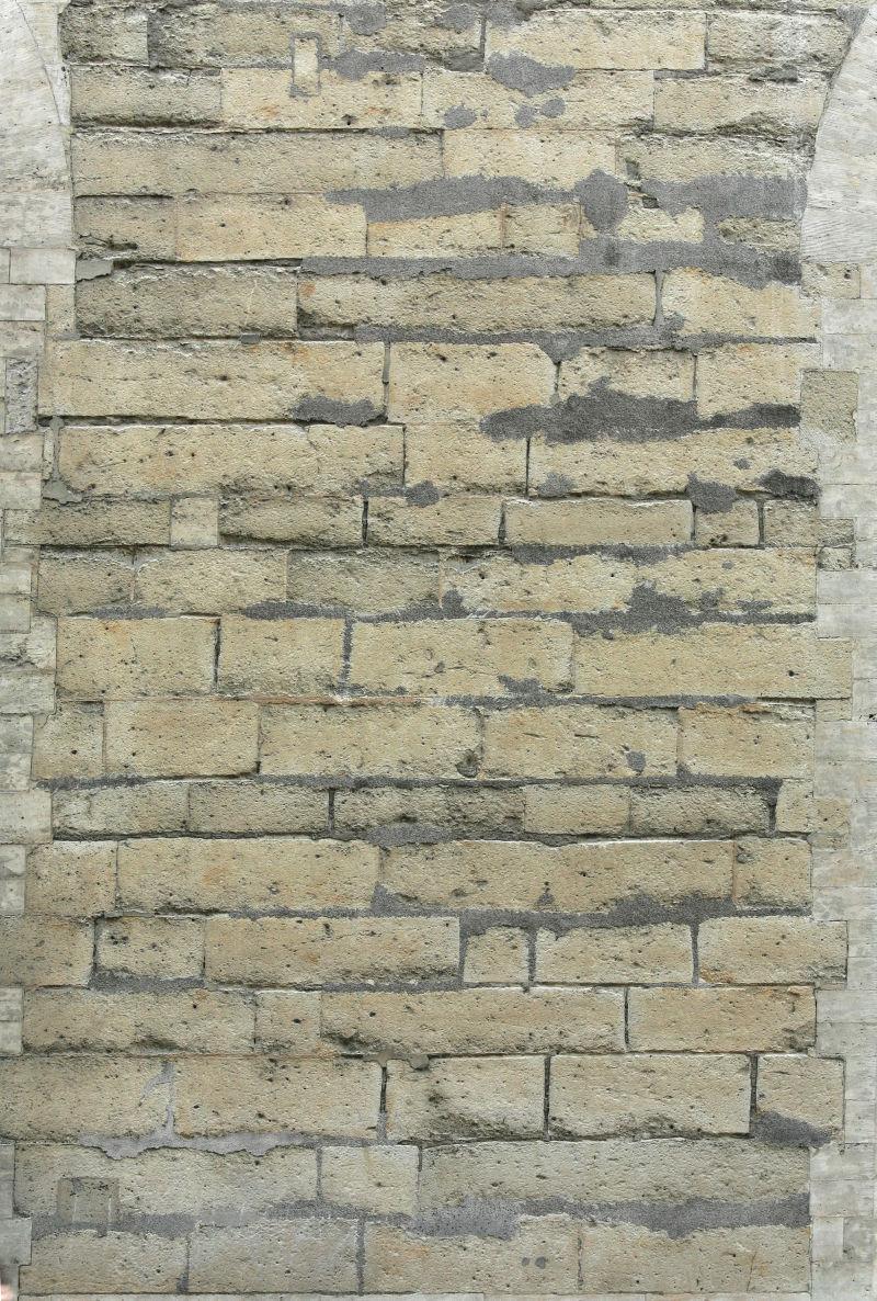 水泥勾缝的砖墙背景