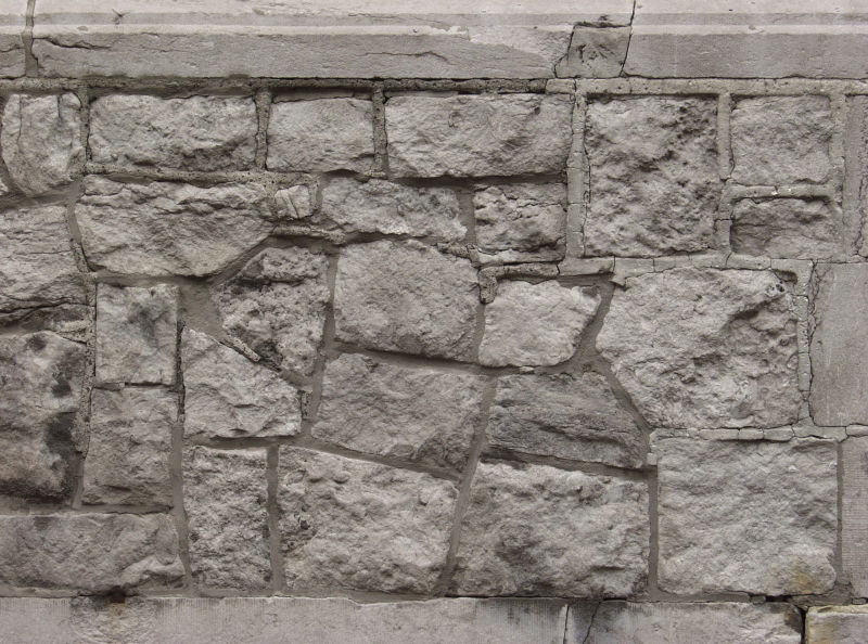 不规则的石头堆砌的墙背景