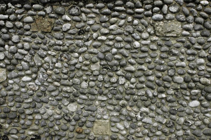 小块鹅卵石铺的石墙背景