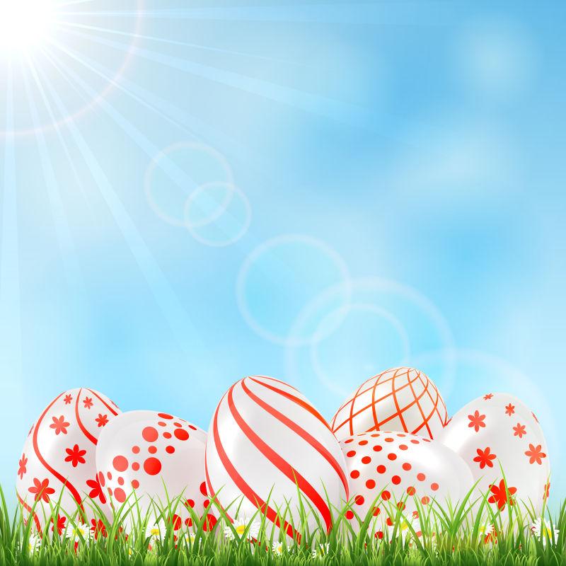 装饰性复活节彩蛋在草地和蓝天中的矢量插图