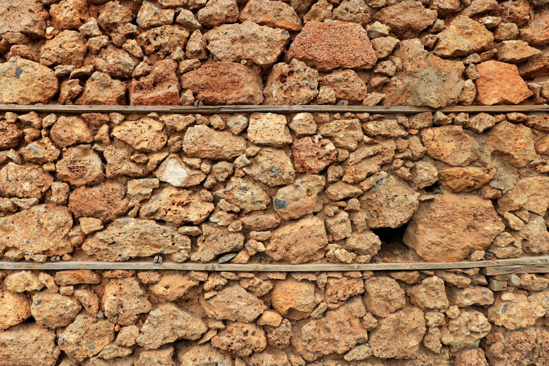 屋壳石砌成鹅卵石层墙体纹理coquina表面背景