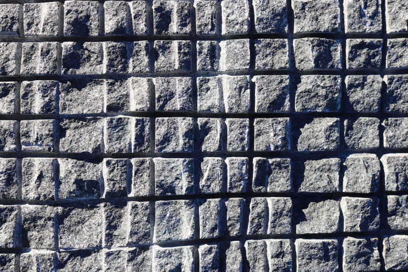 锯成方形的蓝色花岗岩墙纹理花岗岩表面背景