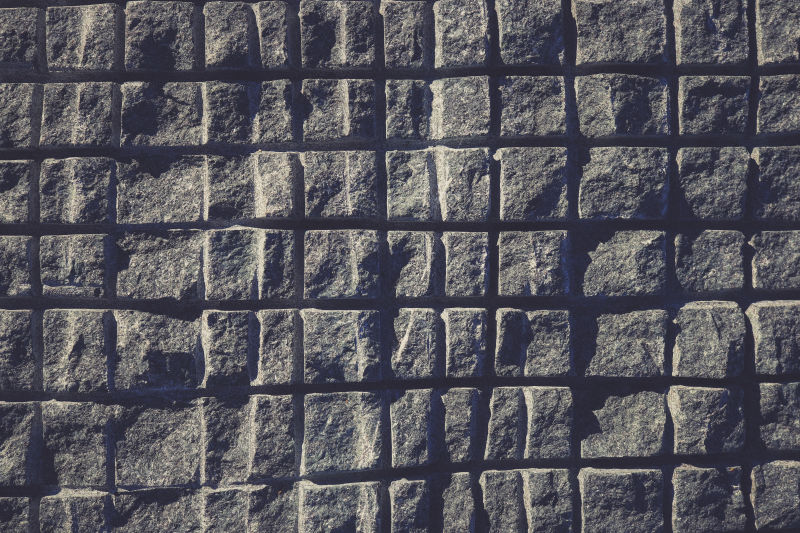 锯成方形的蓝色花岗岩墙纹理花岗岩表面